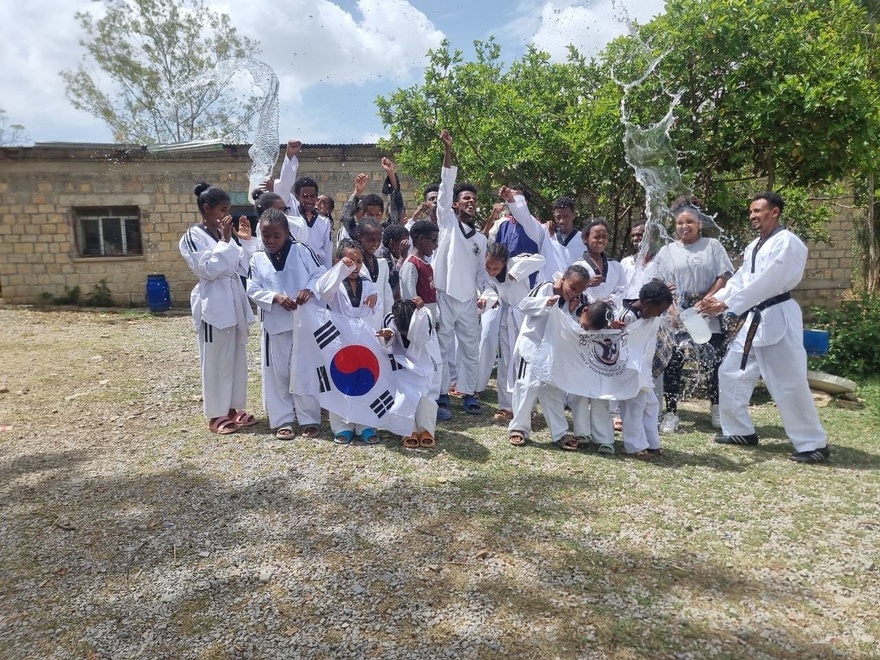 Taekwondo for the Blind students celebrating clean-water access at Mekelle Boarding School